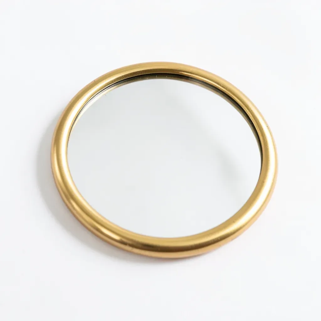 Miroir Arrondi en Métal Doré
